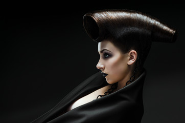 Beautiful lady with an improbable hairdress