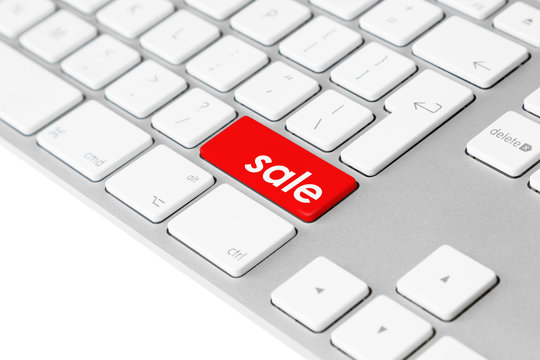 Computer keyboard with red “sale” button