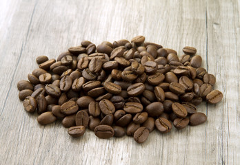 coffee beans on the wooden background