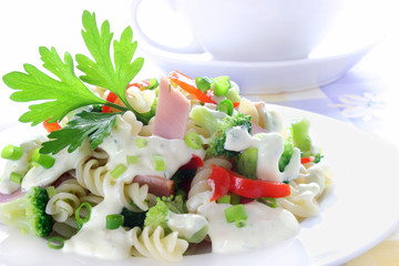 Pasta with broccoli, ham and garlic sauce