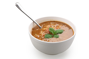 lentil soup in white bowl isolated with clipping path