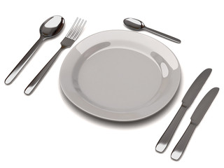 White empty plate with fork, spoon and knife