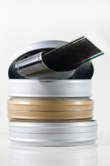 Three old fashioned film tins