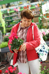 Senior woman in flower shop