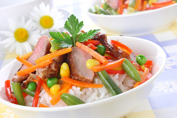 Rice with pork meat and vegetables