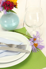 beautiful holiday table setting with flowers