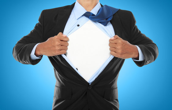 Businessman Showing A Superhero Suit