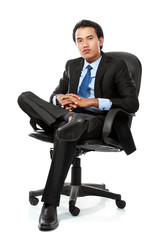business man sits on office chair