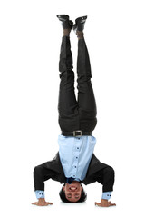 business man doing handstand