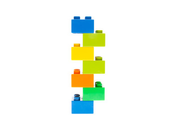 Plastic building blocks on white background