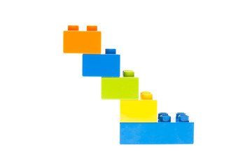 Plastic building blocks on white background