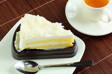 Coconut cake and tea.