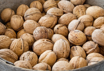many natural inshell walnuts
