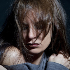 beautiful woman looking desolate