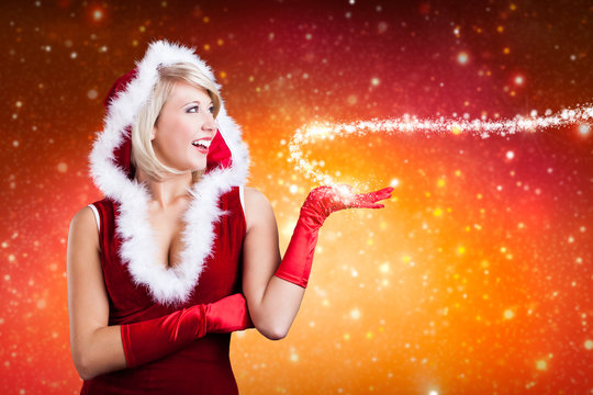 Weihnachtsfrau mit magischem Sternchenlicht