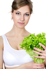 The beautiful girl with green salad