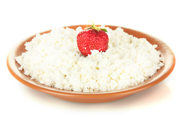 Cottage cheese with strawberry in a plate isolated on white