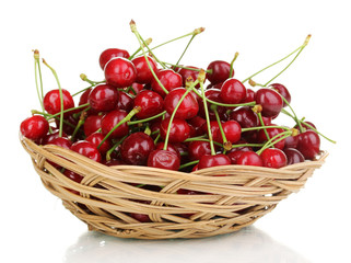 Ripe cherry berries in basket isolated on white