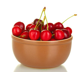 cherry in brown bowl isolated on white