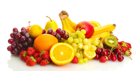 exotic fruits and berries isolated on white