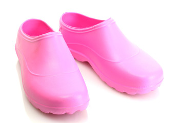 bright pink galoshes isolated on white