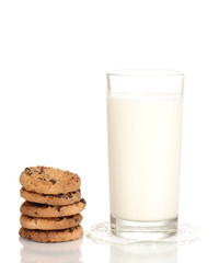 Glass of milk and cookies isolated on white