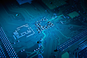 Blue glowing computer motherboard abstract background