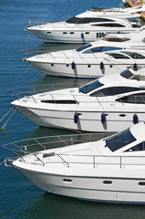 Fototapeta premium White motor yacht over harbor pier, Odessa, Ukraine