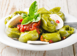 Italian healthy  food - Green spinach tortellini