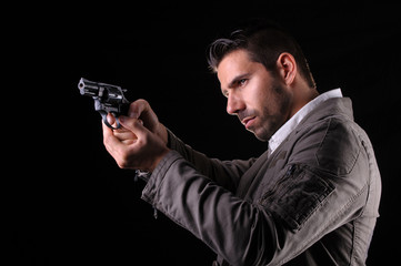 gangster or private detective with a pistol