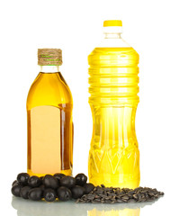 Olive and sunflower oil in the bottles isolated on white