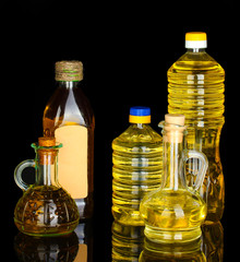 Olive and sunflower oil in the bottles and small decanters