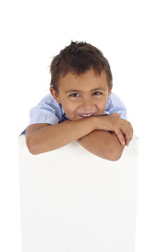 child holding a white board