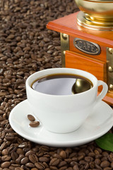 cup of coffee with beans