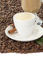 cup of coffee and beans isolated on white