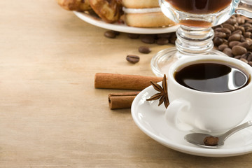 cup of coffee and beans as background