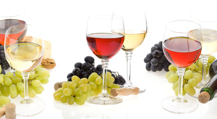 wine in glass and grape isolated on white
