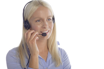 Young professional woman using head-set