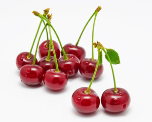 Wet cherry isolated on a white