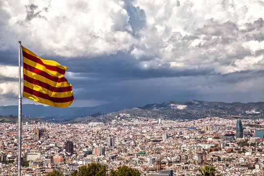 Catalan flag on the background of Barcelona