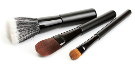black brushes for make-up isolated on white.