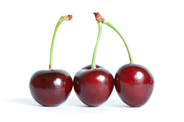 three red cherry isolated
