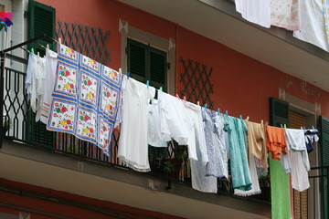 Laundry line outside a window in Italy