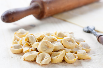 Making homemade tortellini