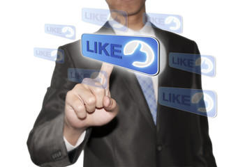 Business man pointing like button