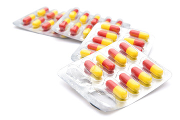 piles of capsules with clipping path