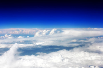 Beautiful view above the earth at the clouds below.