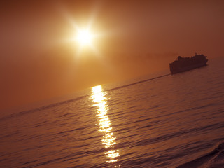 sunset and cruise ship