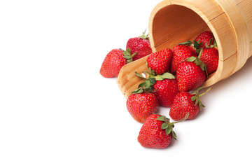 strawberries in basket hanging on a white background