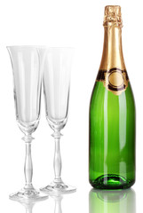 Bottle of champagne and goblets isolated on white